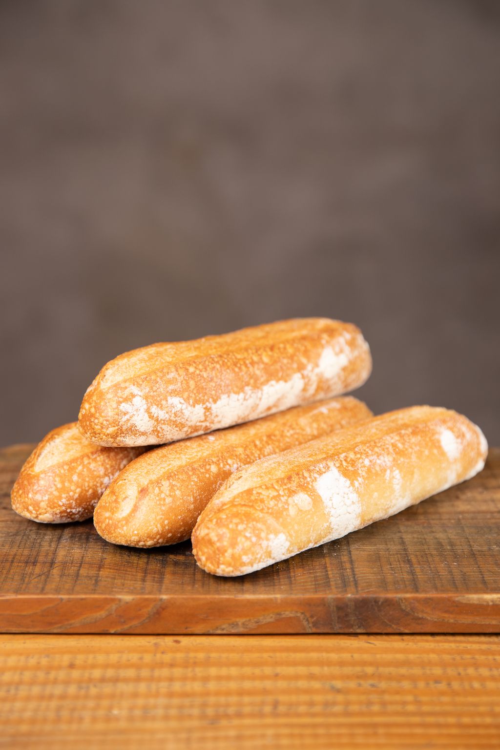 Pão bengala alongado, crocante por fora